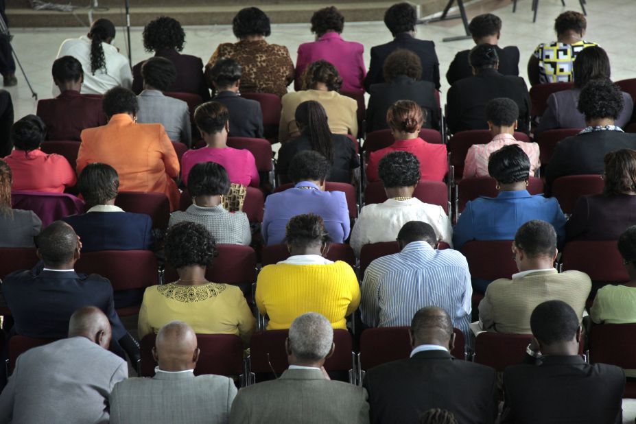 Mourners attend a prayer service held for Mwangi and Wahito at St. Andrews Church in Nairobi on Thursday, September 26.