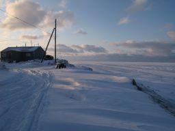 Shelton Kokeok, whose home is shown in November 2009, lives on the edge of the world in Shishmaref, Alaska. 