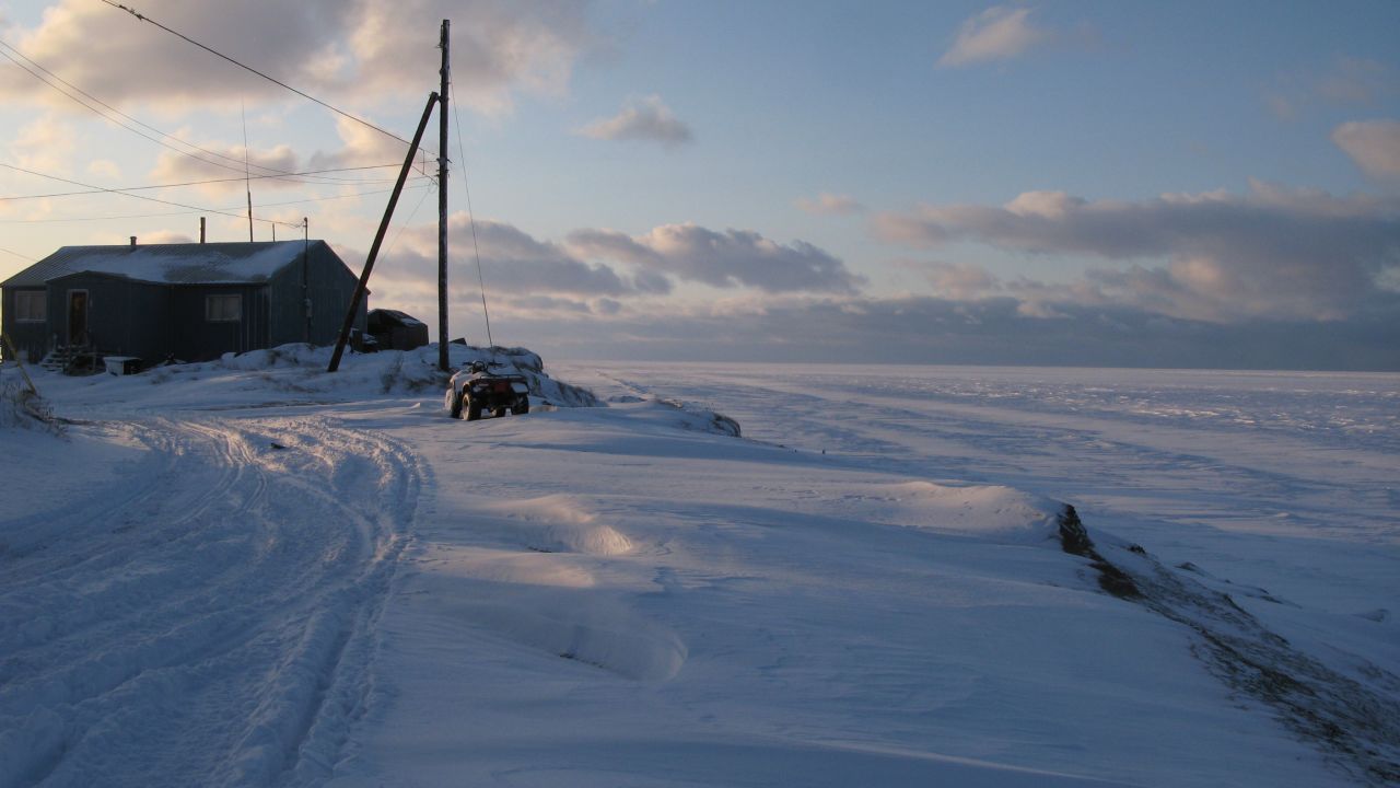 Shelton Kokeok, whose home is shown in November 2009, lives on the edge of the world in Shishmaref, Alaska. 