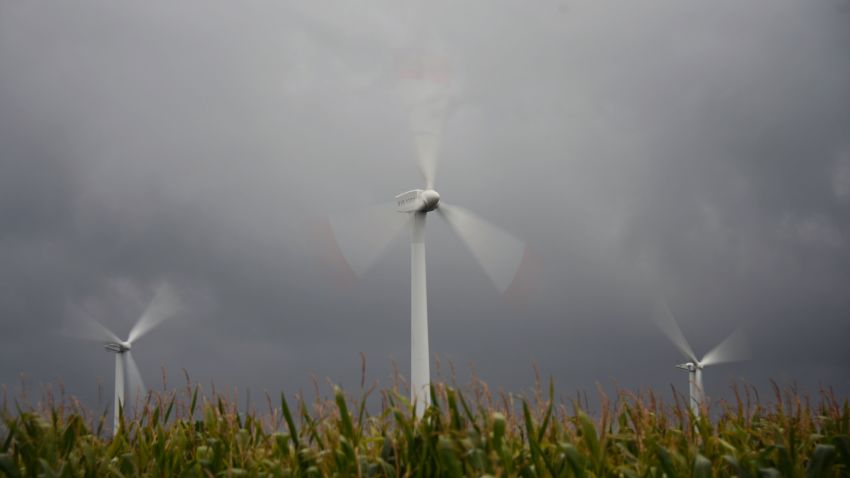 This picture taken on September 18, 2012 in Husum, northern Germany shows wind turbines during the HUSUM WindEnergy 2012 fair. Germany's electrical grid operators on October 15, 2012. German Chancellor Angela Merkel stunned the world in 2011 by deciding to scrap nuclear power for renewables, but as 2013 general election day approaches, a fight has broken out over how to pay for the clean energy drive