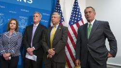House Speaker John Boehner of Ohio, right, and House GOP leaders, participate in a news conference on Capitol Hill in Washington, Thursday, September 26, as pressure builds over legislation to prevent a partial government shutdown. 