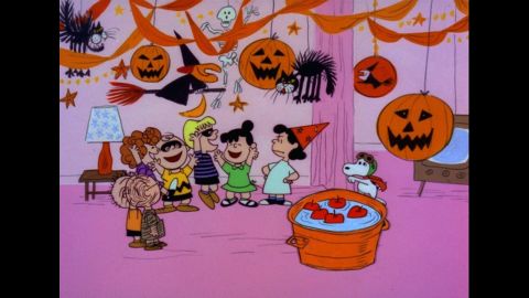 Lucy, far right, is a killjoy who always dampens the mood of sad sack Charlie Brown in the "Peanuts" cartoons.