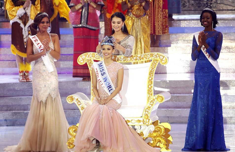 Miss World 2012, Yu Wenxia crowns Megan Young of the Philippines as the new Miss World during the grand finale of the Miss World 2013 beauty pageant held at Bali Nusa Dua in Bali, Indonesia, on Saturday, September 28. "No words! Thank you so much for everyone for choosing me," said Young. "I promise to be the best Miss World ever." Miss France Marine Lorphelin, left, took second and Miss Ghana Carranzar Naa Okailey Shooter, took third. 