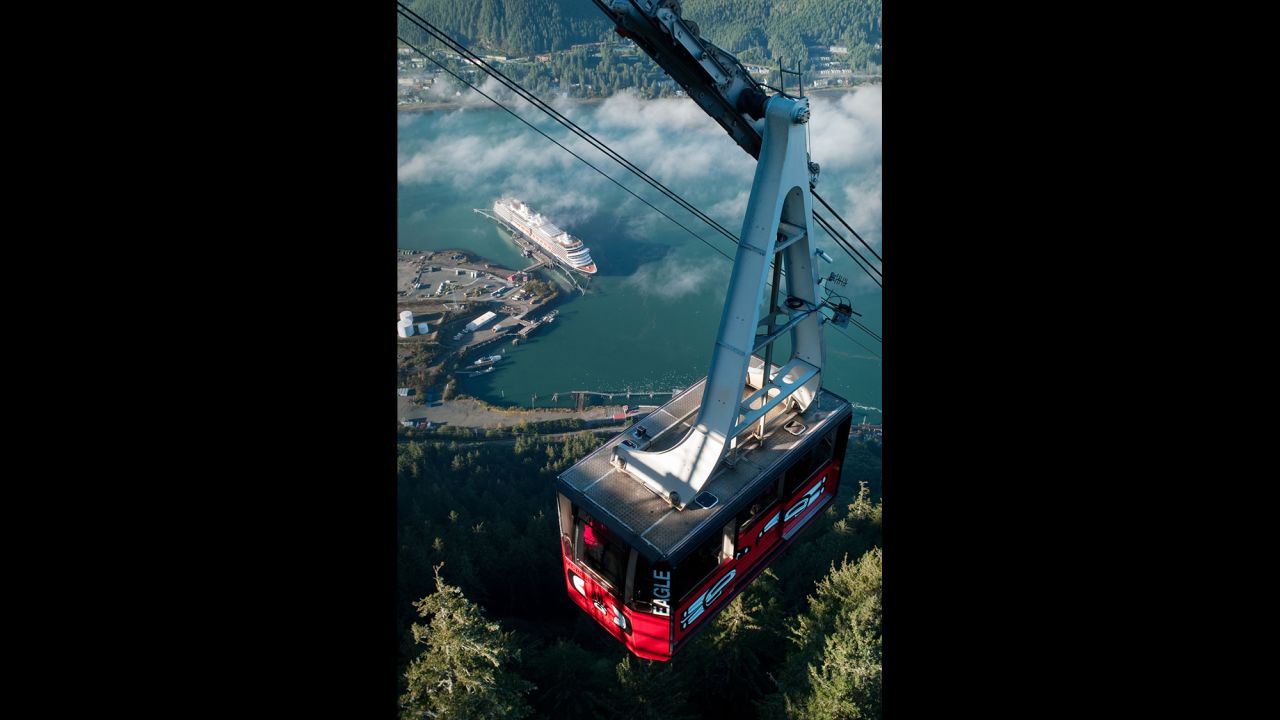 The Mount Roberts Tramway's eagle car approaches the "mountain house" as morning fog breaks up over the Gastineau Channel in Juneau, Alaska, on September 25.