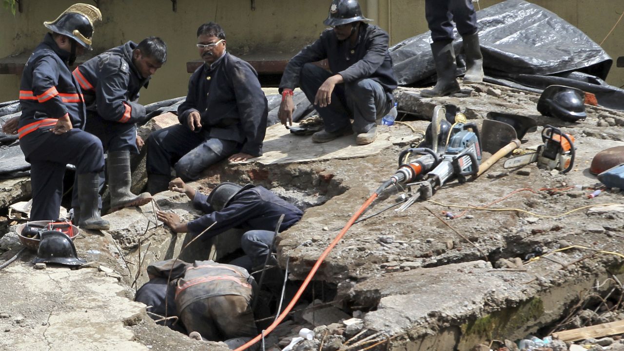 Rescuers search for survivors on September 28.