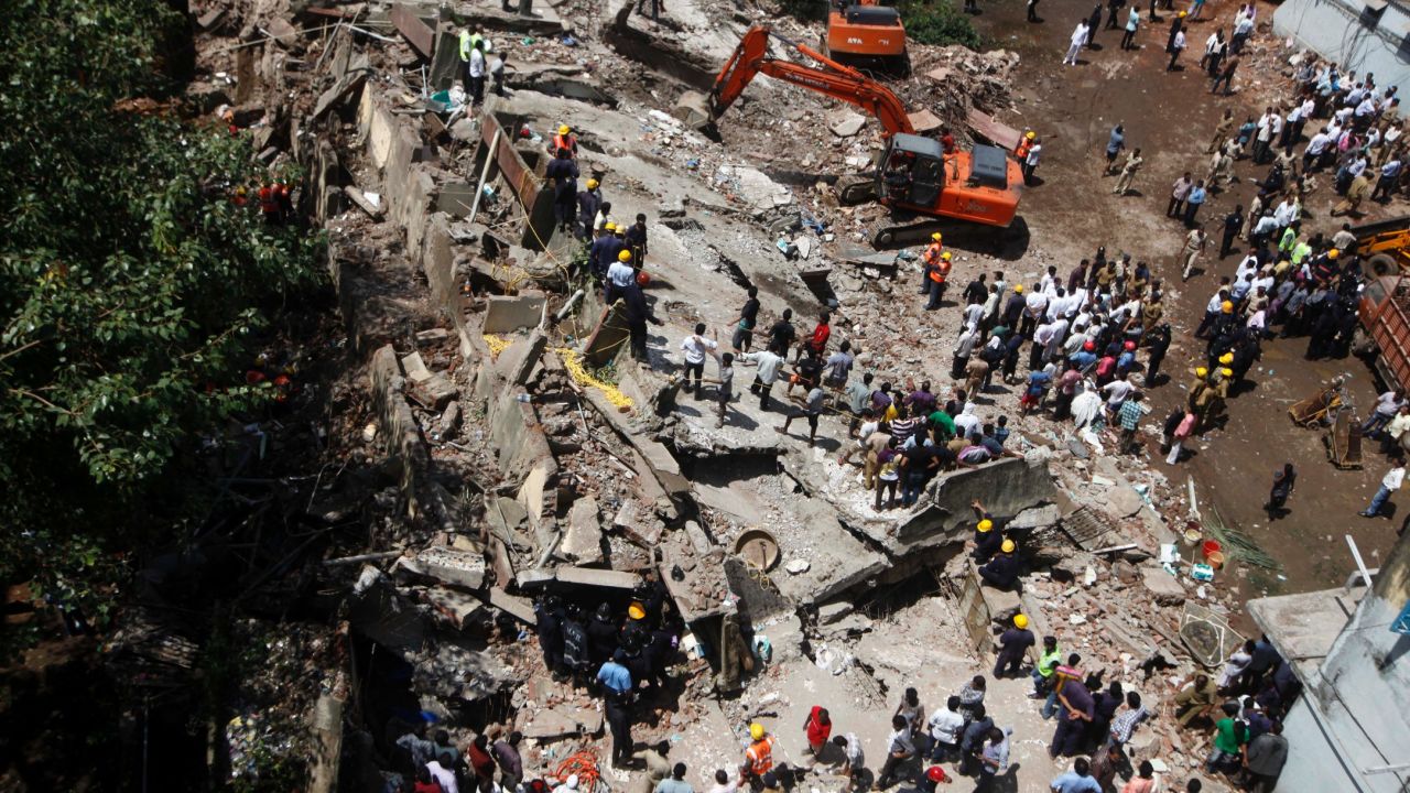People look for survivors and clear debris on Friday, September 27.