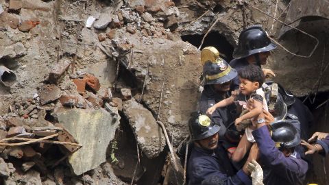 A child is pulled from the rubble on September 27.
