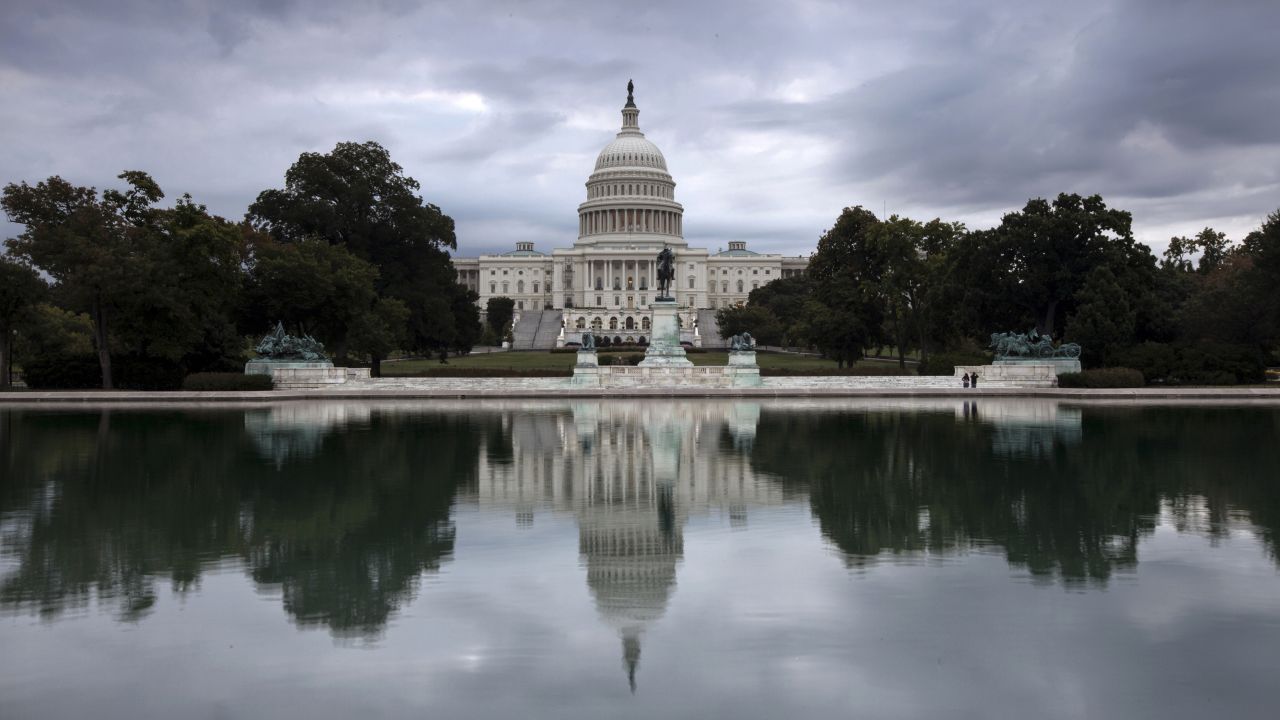 Storm clouds hang over Capitol Hill in Washington on Friday, September 27. Click through to see more photos of weather around the world.