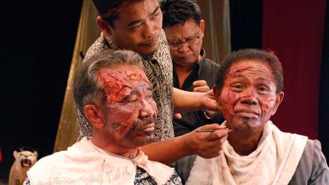 Adi Zulkadry and Anwar Congo in makeup for "The Act of Killing"