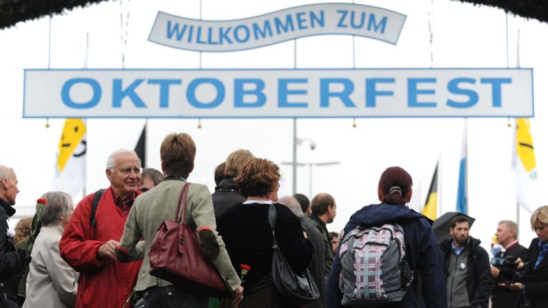 People stand outside of the memorial for the victims of the 1980 Oktoberfest bombing on Thursday, September 26. 