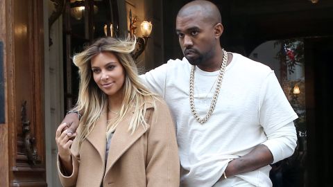 Kim kept a low profile following the arrival of the couple's daughter, North, in June, but toward the end of September she showed off both a new hair color and her post-baby physique in Paris as Kanye stayed close.