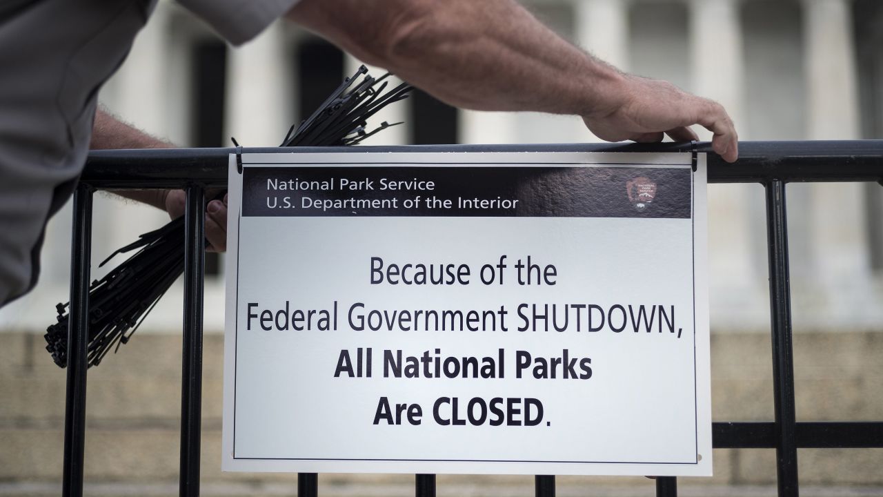 A U.S. park ranger posts a closed sign at the Lincoln Memorial on October 1.