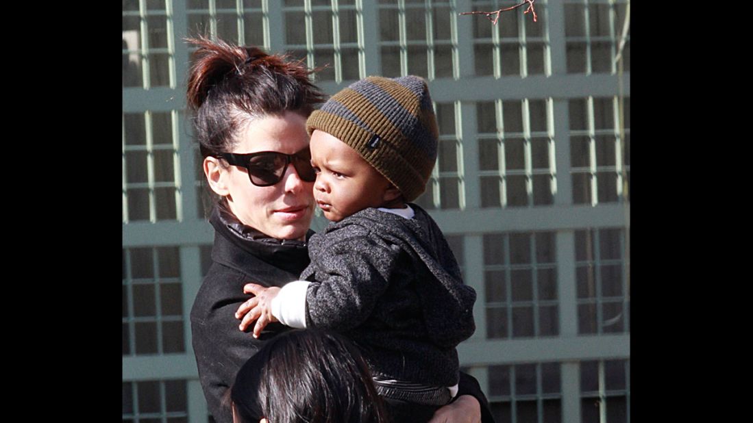 Bullock and her son, Louis, on the streets of Manhattan in 2011.