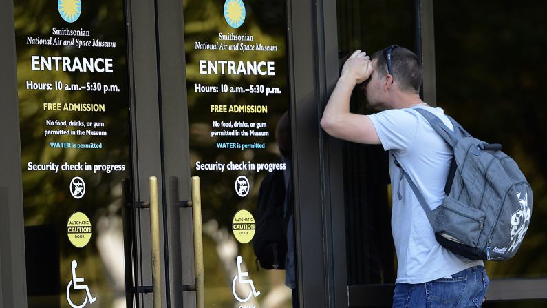 A man looks into the closed Smithsonian National Air and Space Museum in Washington on October 1.
