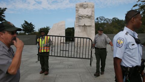 Park police and Park Service employees close down the Martin Luther King Jr. Memorial on the National Mall on October 1.
