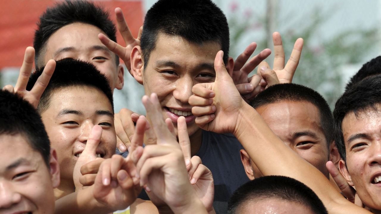 Lin, now a player for the the Houston Rockets, posed for photos with fans while visiting southwestern China on August 30. 