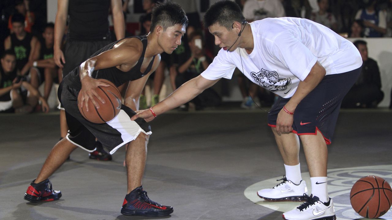 Lin, right, held a basketball clinic with young players in Taiwan in 2012. Lin remains one of few Asian-Americans in the NBA, and the first American of Taiwanese descent to play in the league.