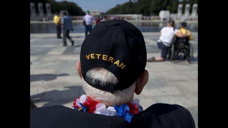 World War II Veteran George Bloss, from Gulfport, Mississippi, looks out over the National World War II Memorial in Washington, on October 1. Veterans who had traveled from across the country were allowed to visit the National World War II Memorial after it had been officially closed because of the partial government shutdown.