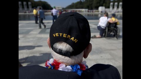 World War II Veteran George Bloss, from Gulfport, Mississippi, looks out over the National World War II Memorial in Washington, on October 1. Veterans who had traveled from across the country were allowed to visit the National World War II Memorial after it had been officially closed because of the partial government shutdown.  