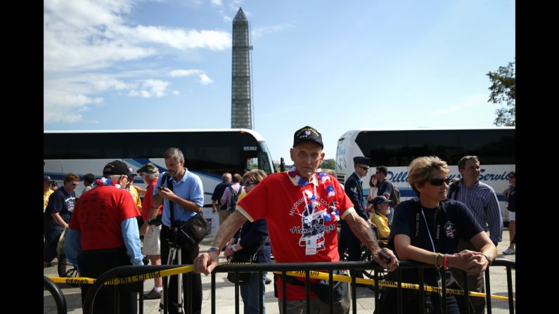 World War II veteran Russell Tucker of Meridian, Mississippi, stands outside the barricade as he visits the World War II Memorial in Washington on October 1.