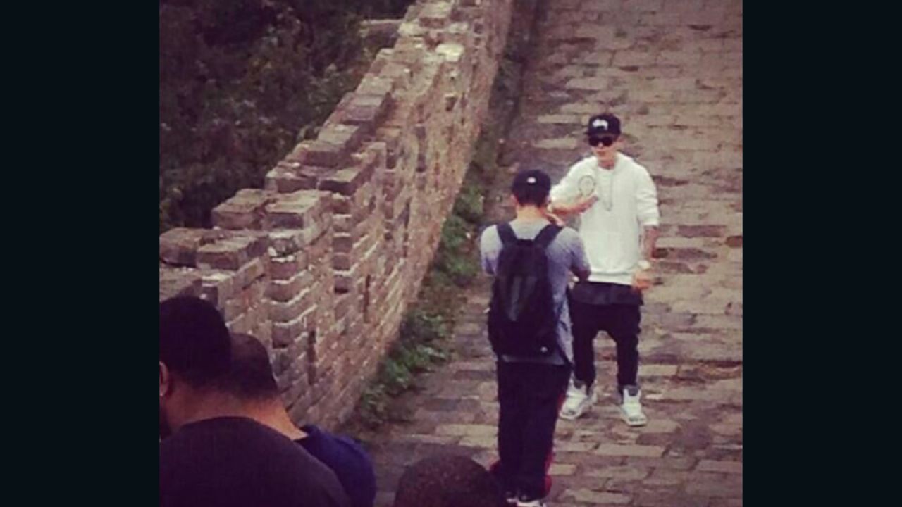 Justin Bieber, safe and secure on top of the Great Wall of China. A snap of the superstar letting his bodyguards carry him up the stairs has earned him a fair bit of mockery at home and abroad.