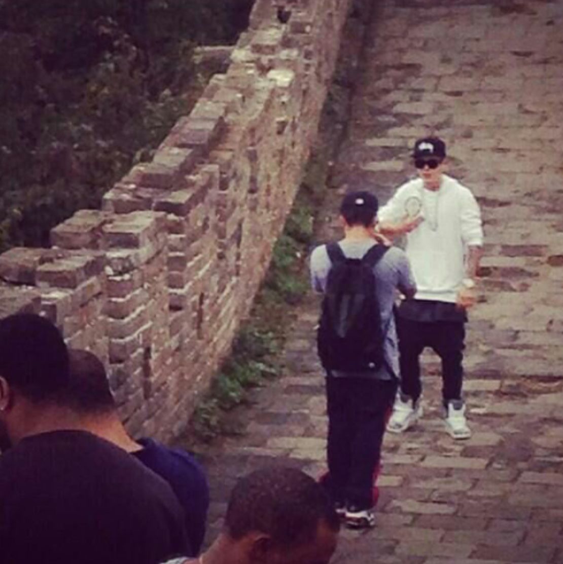 Justin Bieber, safe and secure on top of the Great Wall of China. A snap of the superstar letting his bodyguards carry him up the stairs has earned him a fair bit of mockery at home and abroad. 