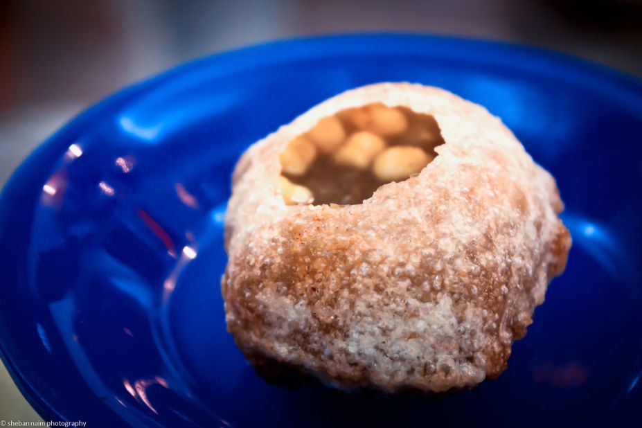 A favorite Indian street snack found in Dubai is pani puri. Hollow balls of fried dough are filled to the brim with potatoes, sprouts, spicy tamarind water and a sweet chutney.
