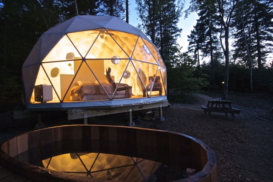The Dream Domes in New Brunswick are semi-transparent and provide spectacular views of the surrounding forest. Large terraces with wood-fired hot tubs are highlights. 