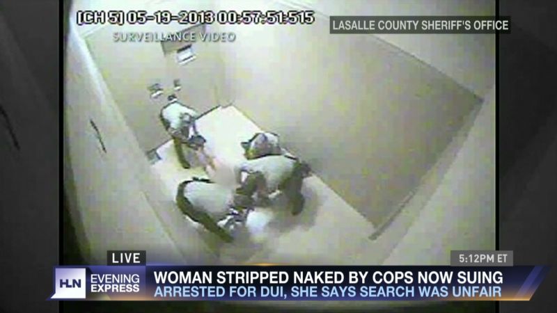 Four cops strip woman naked