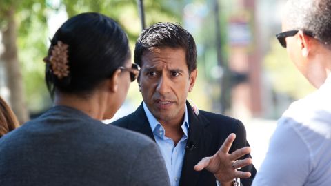 Dr. Sanjay Gupta talks about Obamacare with a couple in Greenville, South Carolina. 
