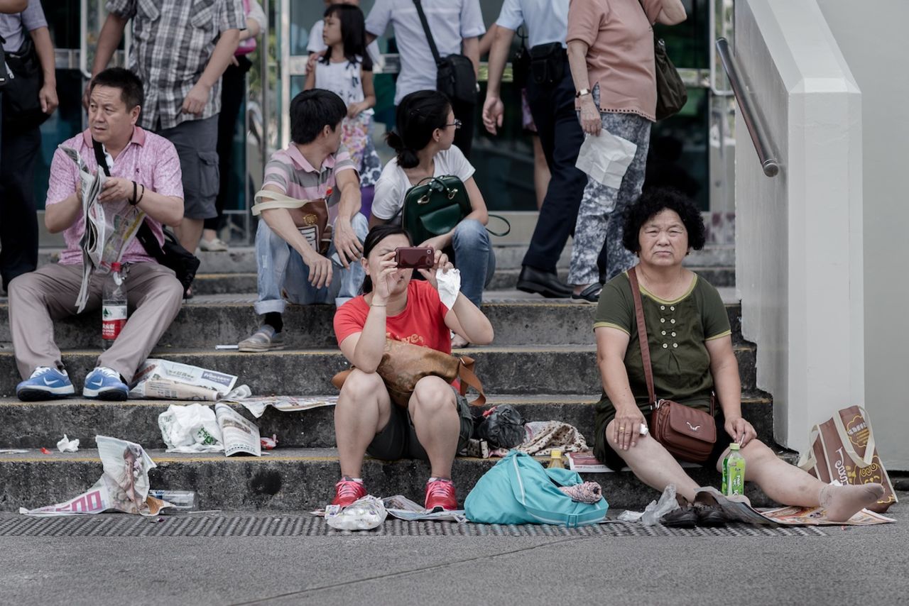 China's National Tourism Administration publicized a 64-page "Guidebook for Civilized Tourism" on its website ahead of the Golden Week public holiday that started on October 1, the same day the country's new tourism law came into effect. Golden Week is one of the most popular times of year for the Chinese to travel. Here, tourists visit a waterfront promenade in Hong Kong.