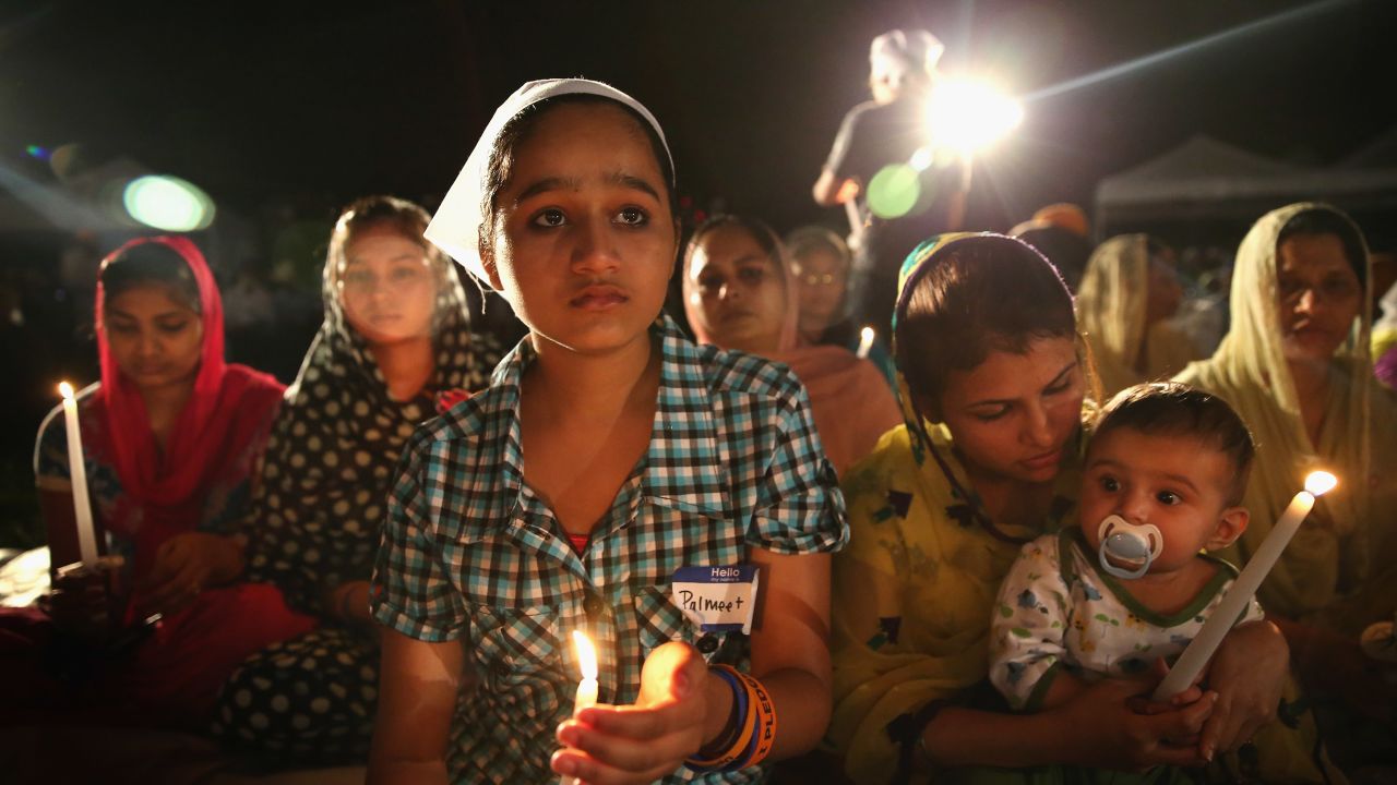 Palmeet Kaur, whose father was killed by a gunman at the Sikh Temple of Wisconsin, attends a vigil on August 5.