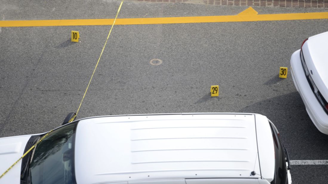 Police evidence markers are placed at the scene outside the U.S. Capitol.<br />