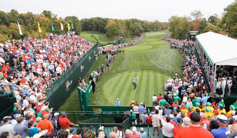 The Presidents Cup isn't as prestigious as the Ryder Cup but the fans still showed up in droves. Here they watched as Australia's Jason Day struck his tee shot.