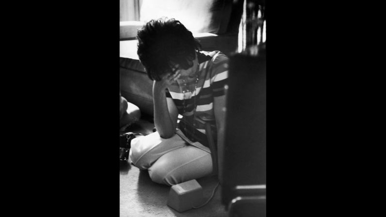 Marilyn Lovell, wife of astronaut Jim Lovell, listens to the "squawk box" at home during the Apollo 13 crisis, April 1970.