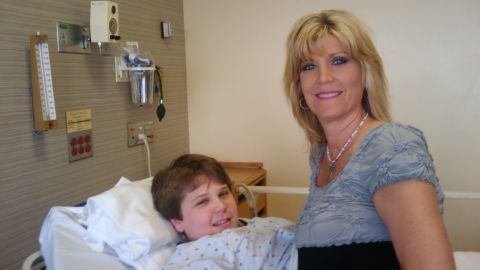 iReporter Leslie Martella and her son Garrett Buckelew, then 12, before his first trigeminal neuralgia surgery.