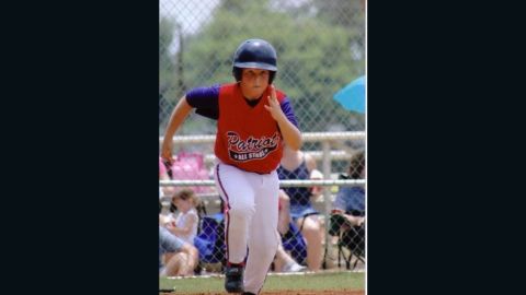 Garrett Buckelew playing baseball before being diagnosed.