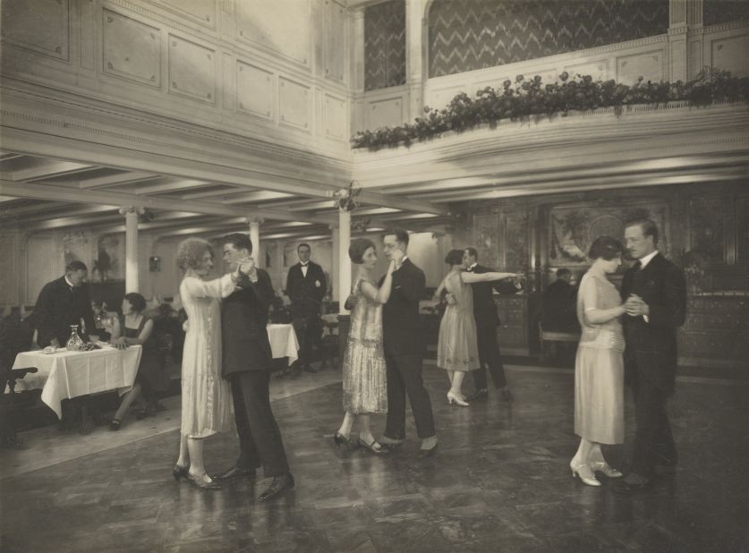 It was a different story for first class passengers, who had all the comforts of a luxury hotel, such as this ballroom pictured in 1910. 
