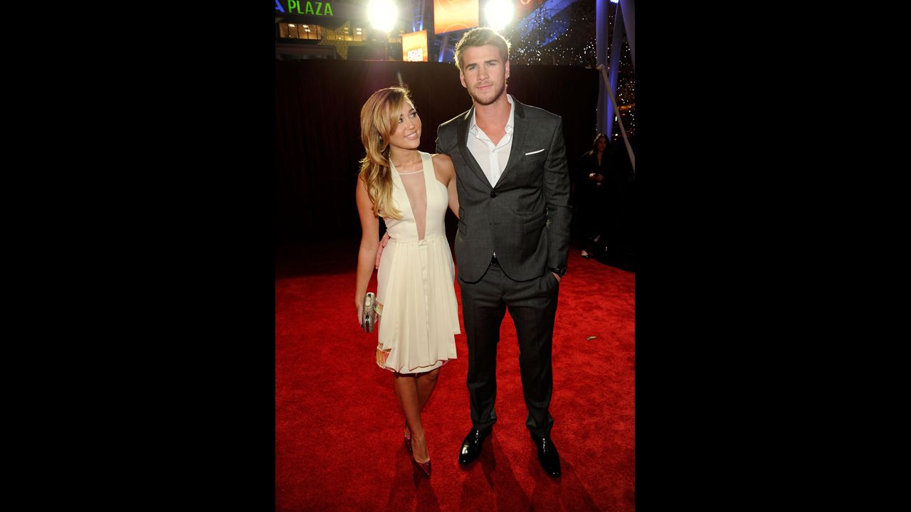 Cyrus and Liam Hemsworth arrive at the 2012 People's Choice Awards at the Nokia Theatre L.A. Live in January 2012 in Los Angeles.