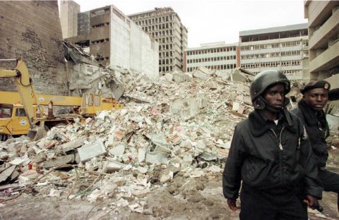 The blast on August 7, 1998 at the U.S. Embassy in Nairobi, Kenya, killed more than 200 people. Kenyan security guards keep watch on August 8, 1998, at the scene of explosion.