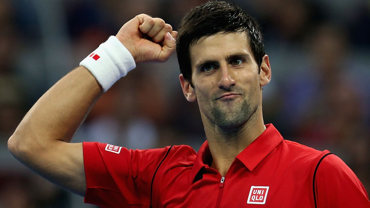 Serbian tennis star Novak Djokovic celebrates after beating Rafael Nadal in the China Open men's final in Beijing.