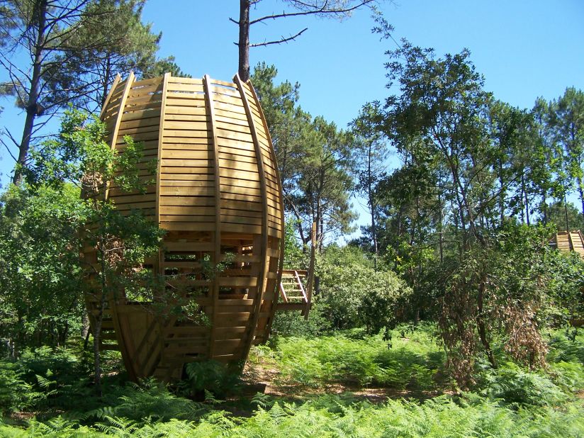 The resemblance of Cap Cabane's tree houses, in a forest near Bordeaux, France, to giant-squirrel food is meant to make them blend into the background -- sort of.