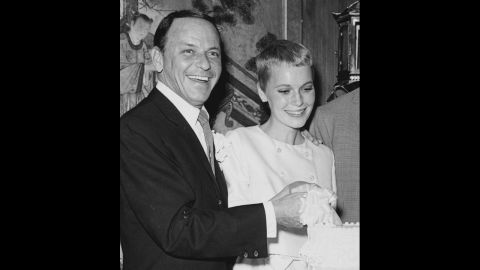 Frank Sinatra and Mia Farrow cut their wedding cake in Las Vegas in July 1966. They were married for 18 months.