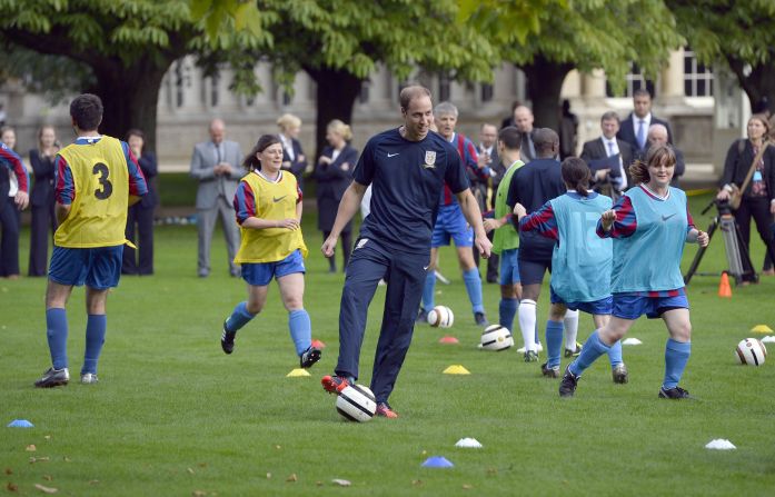 Prince William shows off his footballing skills during a training session on the grounds of Buckingham Palace.
