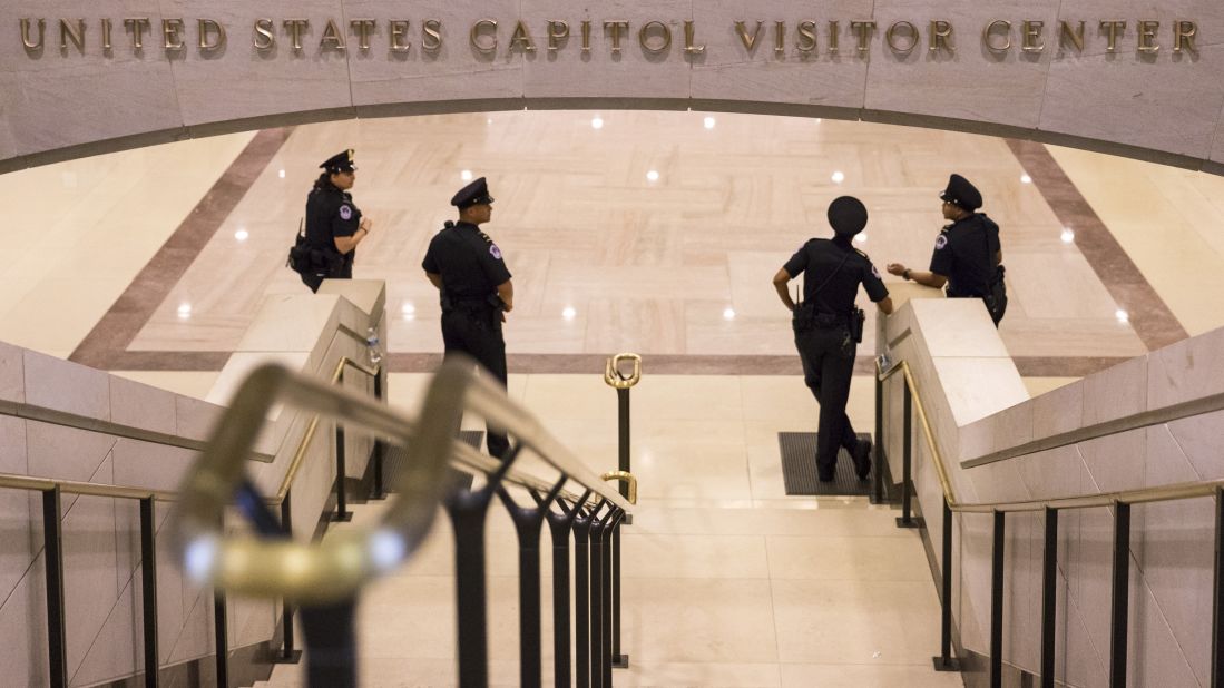 Officers stand at the base of stairs leading to the Capitol Rotunda on Monday, October 7.