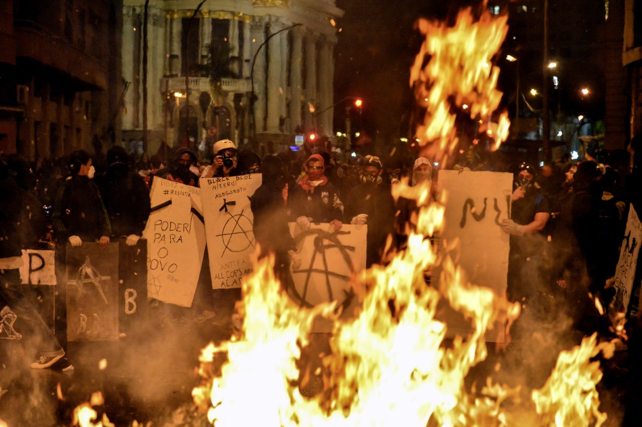 Fires raged outside Rio's City Hall as demonstrators burned trash during the October protests. 