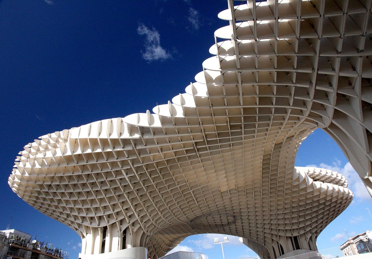 The Metropol Parasol is one of the world's largest wooden structures. Located in Seville, Spain, it stands in stark contrast to the city's historical and urban environment. Its architect, J. Mayer H., received the Red Dot Design Award in 2012 for its sophisticated design.<strong>Architect</strong>: J. Mayer H.
