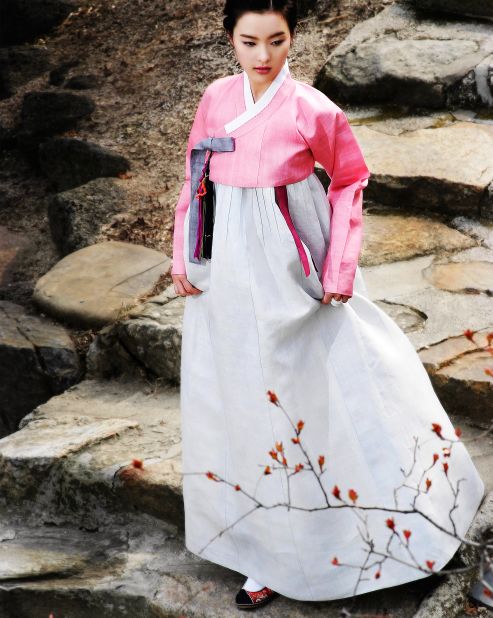 Hanbok for women is generally divided into two pieces, the long-sleeved top (jeogori), and voluminous floor-length skirt (chima). The color pink is usually reserved for young girls or engagement ceremonies.