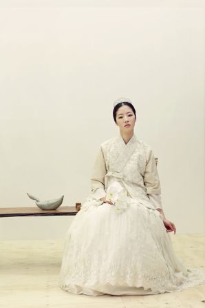 White hanbok isn't normally worn in Korean society, but designers are reintroducing the concept as modern bridal wear. 