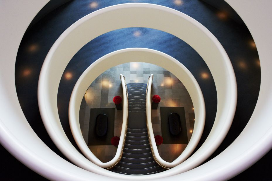 Inspired by the company's aviation business, this hotel's curving walls are reminiscent of airline engines.